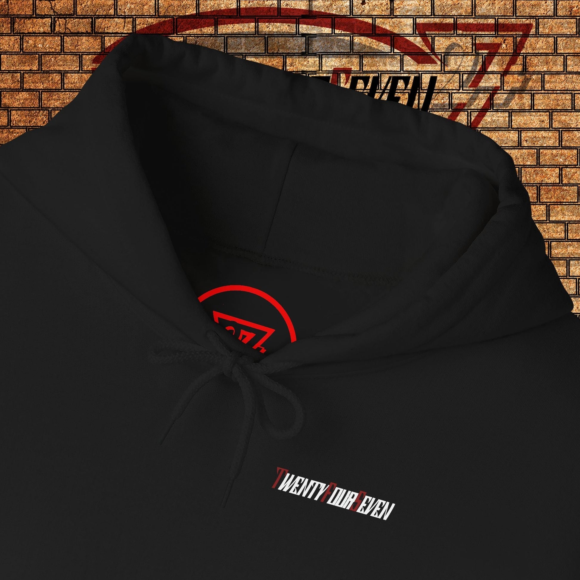 Black printed hoodie with twentyfourseven logo, adjustable hood, and kangaroo pocket.