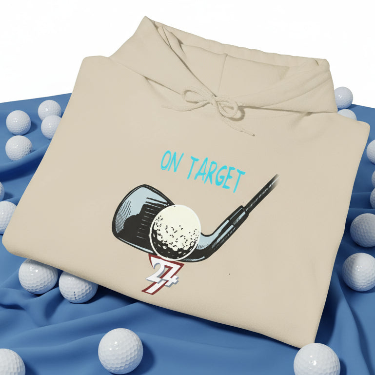 Folded beige golf hoodie with hand-drawn golf club and ball design and "On Target" text