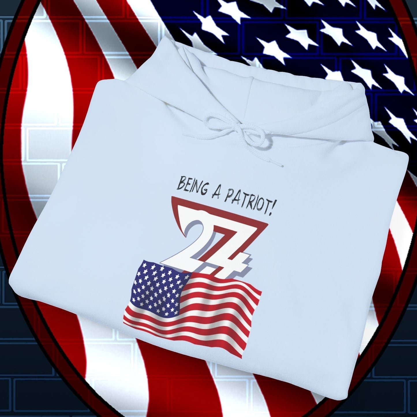 Folded light blue USA flag hoodie with patriotic hand-drawn design and kangaroo pocket on American flag background shield