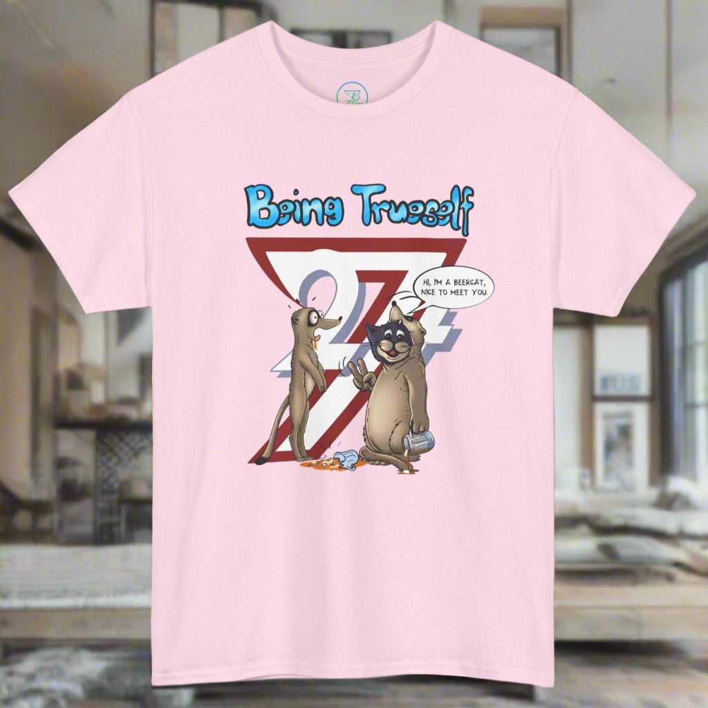 Funny cat t-shirt with cartoon cat and meerkat design promoting being true to oneself on pink fabric