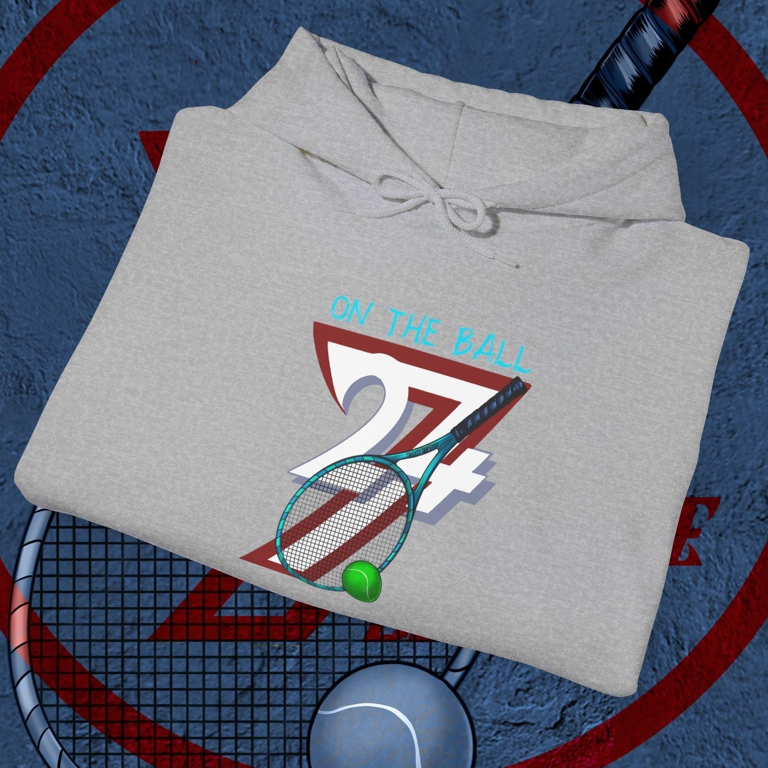 Gray tennis hoodie with hand-drawn tennis racket, ball, and "On the Ball 24/7" graphic design