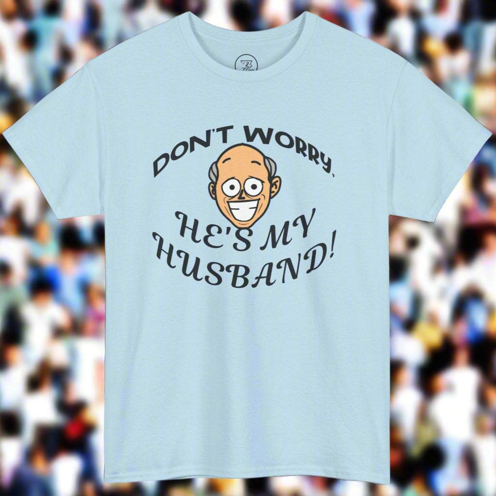 Light blue Kiss Cam T-shirt with funny "Don't worry, he's my husband!" quote and cartoon face design for concert goers