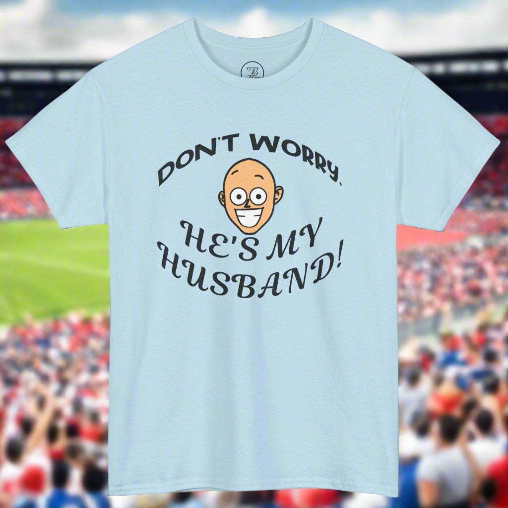 Light blue unisex Kiss Cam safe tee with funny "Don't worry, he's my husband!" quote and cartoon face, perfect for concert goers.