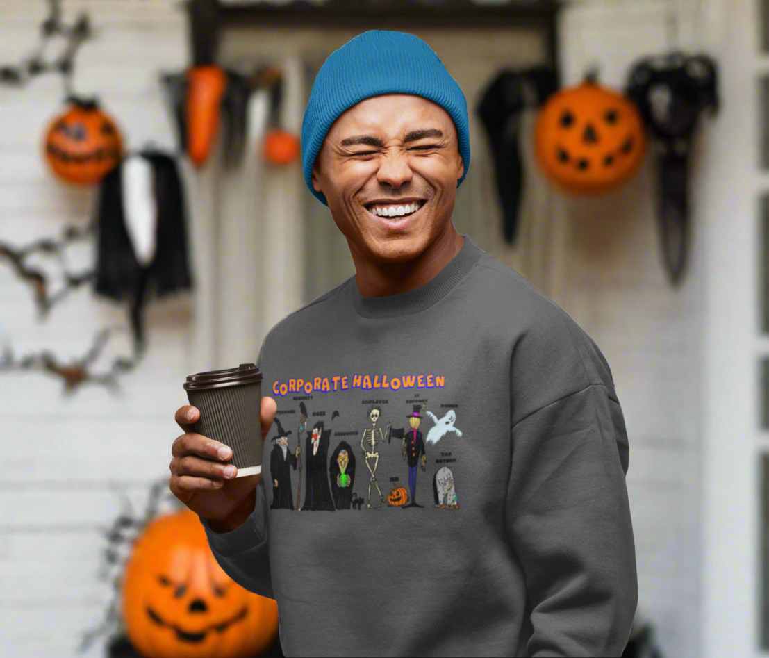 Man wearing a funny Halloween sweatshirt for colleagues with cartoon characters and "Corporate Halloween" text, holding coffee cup and blue beanie.