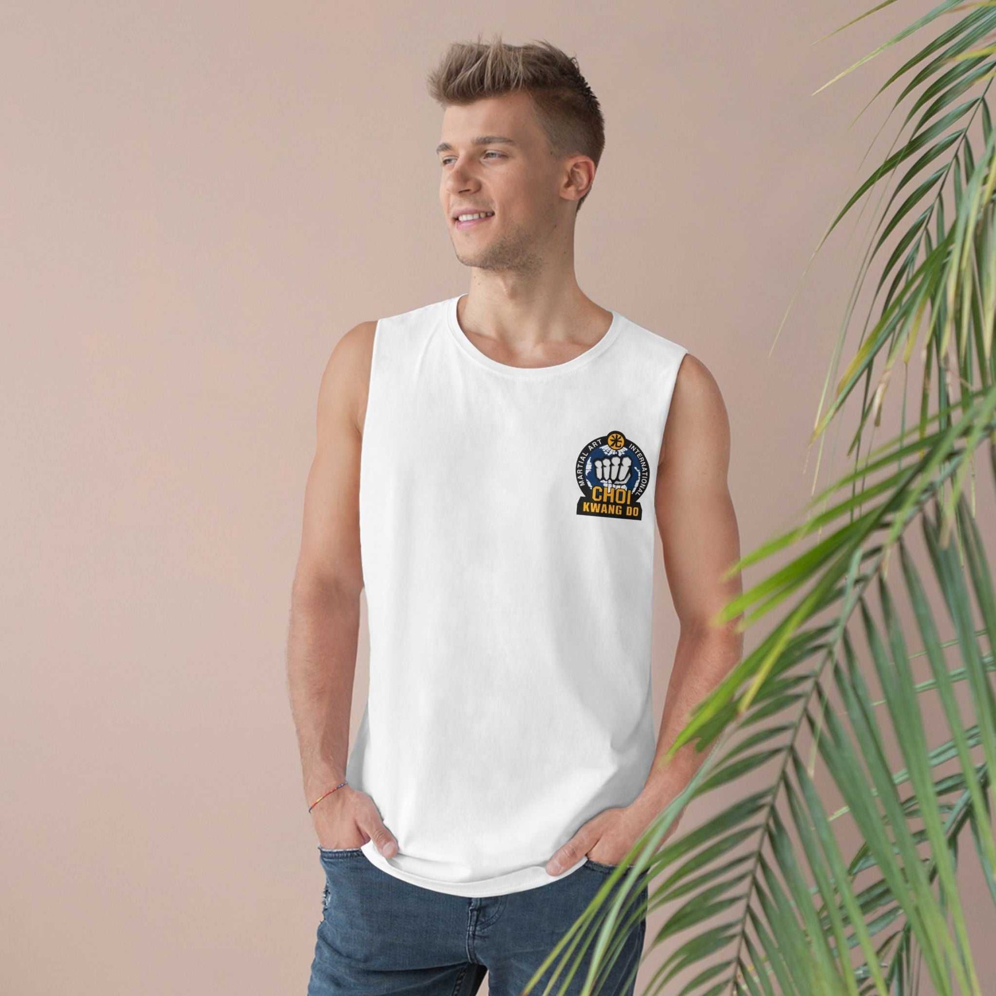 Martial arts practitioner wearing Choi Kwang Do white tank top