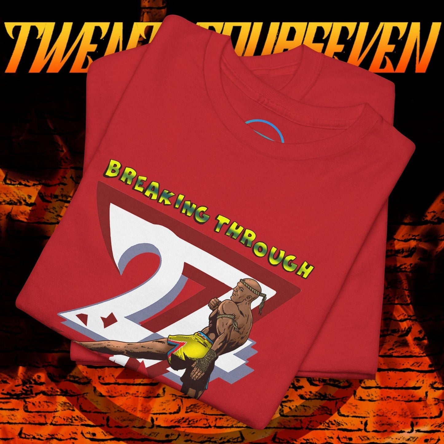 Red Muay Thai t-shirt with bold comic-style fighter illustration and "Breaking Through" text, streetwear style.