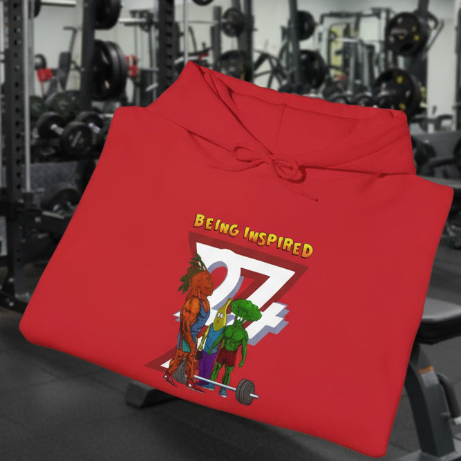 Red custom hoodie with comic banana and broccoli workout characters and "Being Inspired" text design
