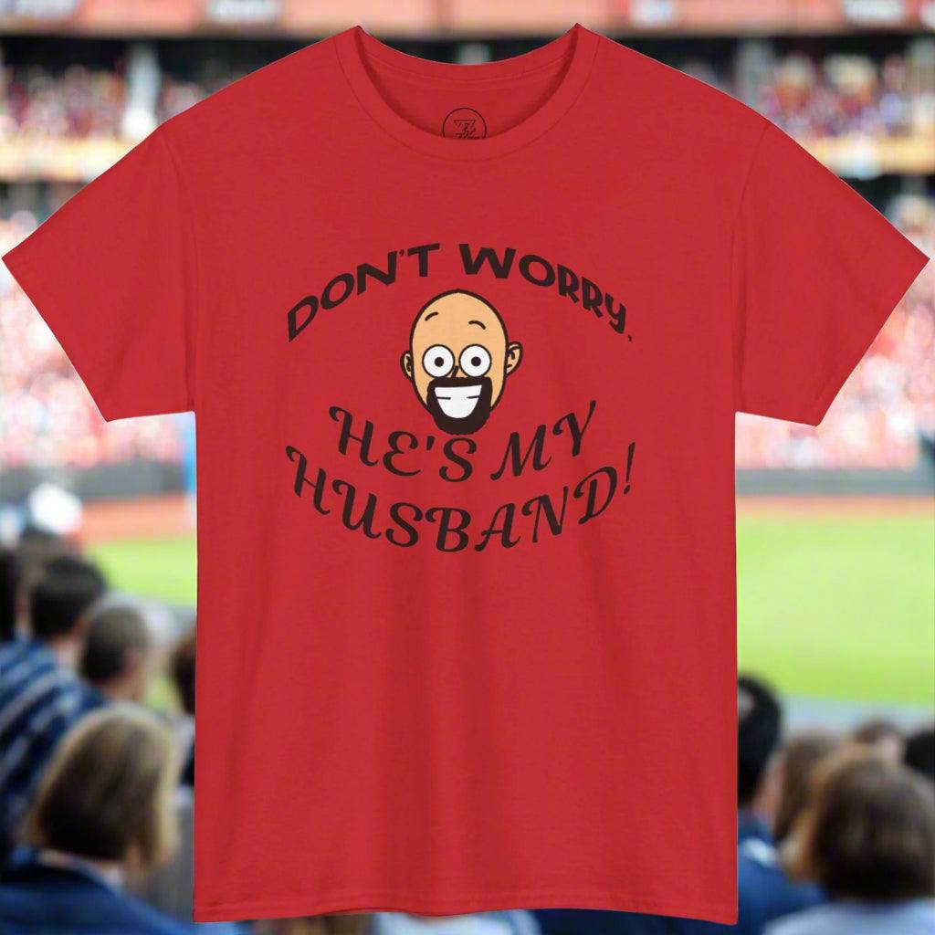 Red unisex Kiss Cam shirt with funny "Don't worry, he's my husband!" quote and cartoon face design.