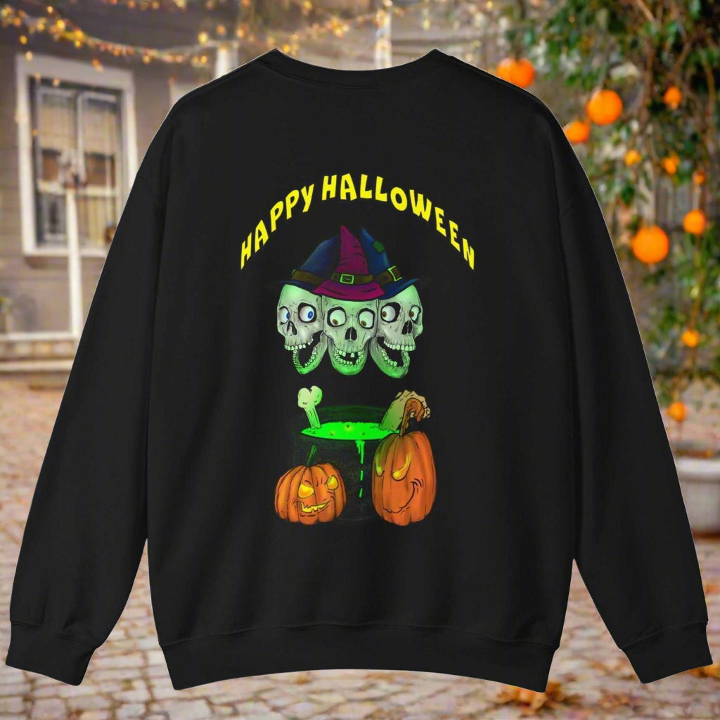 Black Halloween sweatshirt with three skull heads wearing a witch hat, bubbling cauldron, and two pumpkins design with "Happy Halloween" text.