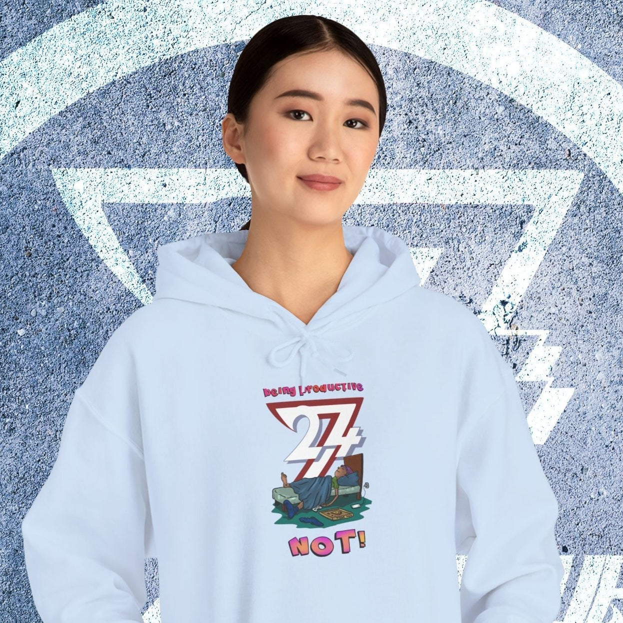 Teen wearing funny custom hoodie with cartoon lazy design and kangaroo pocket against textured wall background
