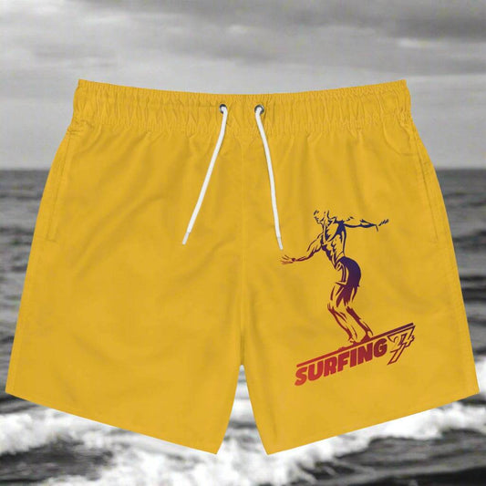 Yellow surfer swim trunks with adjustable white drawstring and surfer illustration design on right leg.