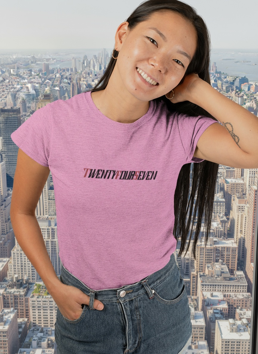 Woman wearing pink unique design t-shirt with bold "twentyfourseven" text, casual fit for night outs and parties
