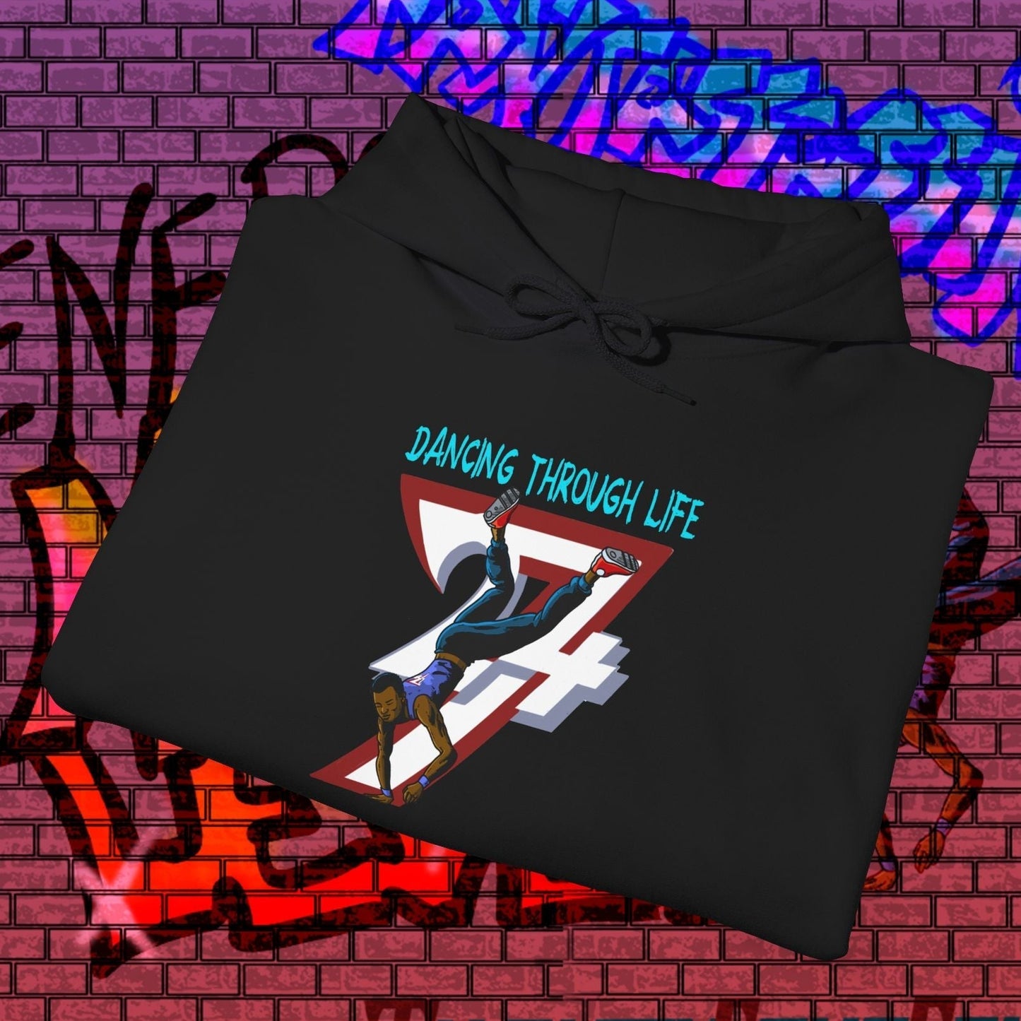black street dance hoodie with hand-drawn dancer and "Dancing Through Life" text on front