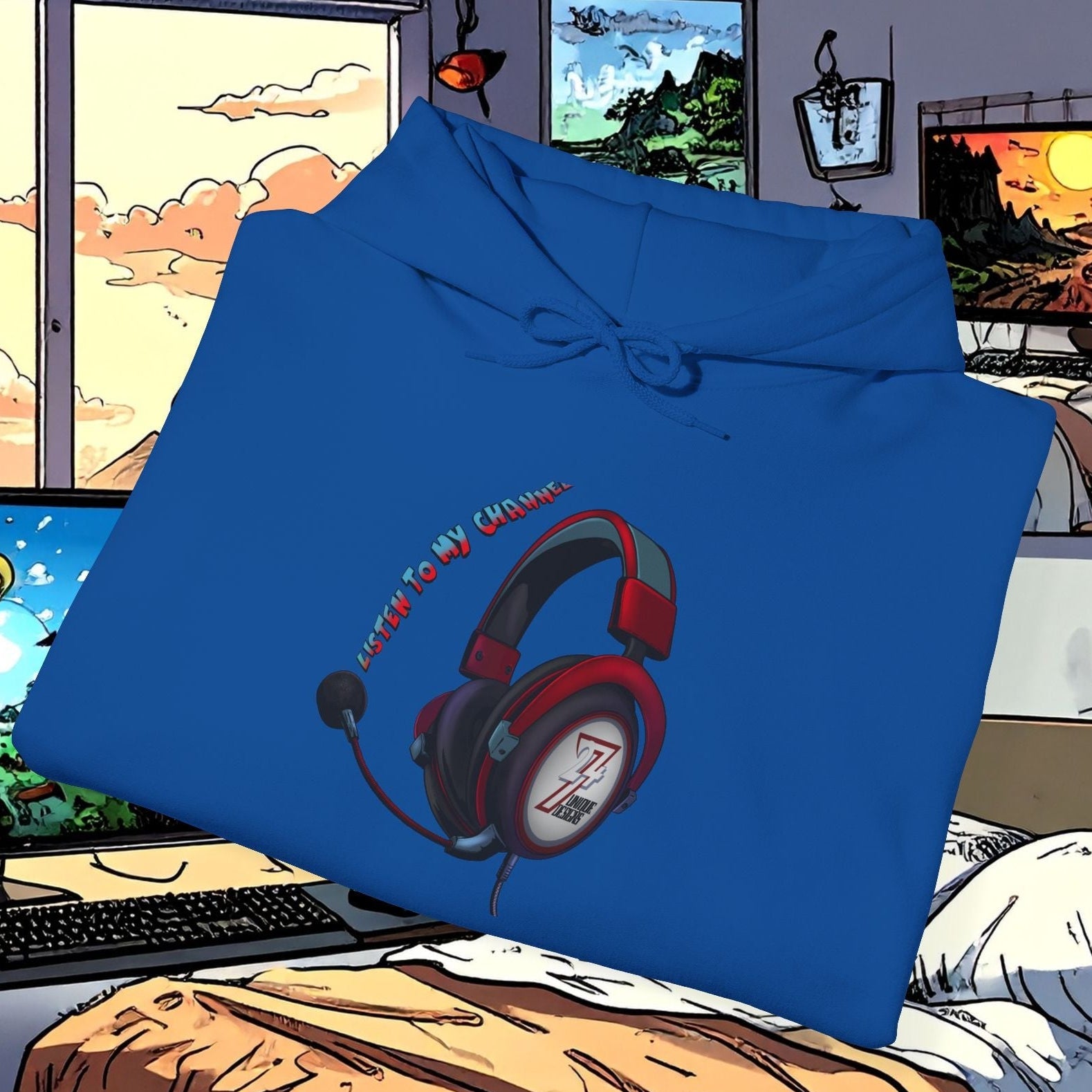 blue headset hoodie with red and black headphone design folded on bed in gaming room