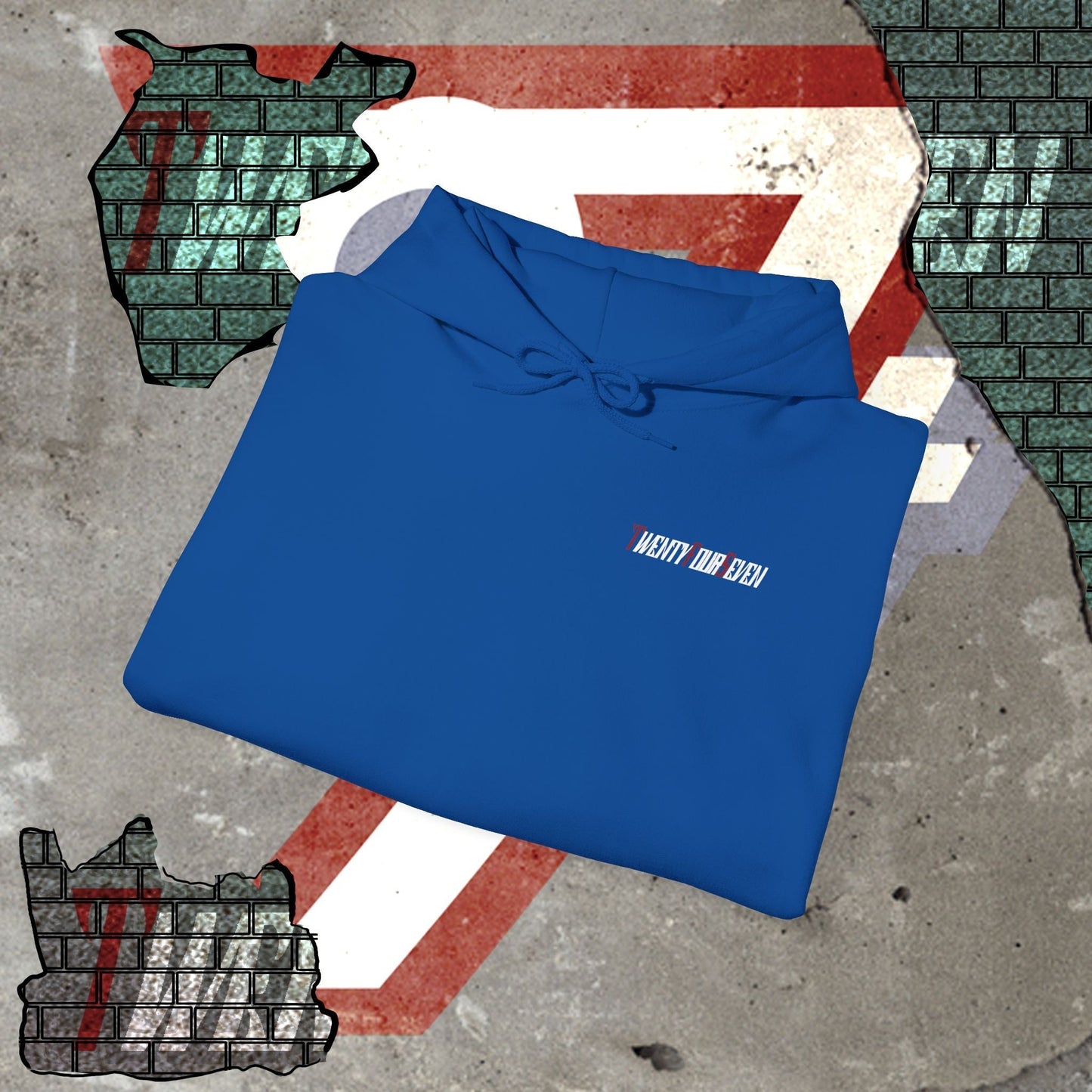 blue printed hoodie with twentyfourseven logo folded on textured surface with graphic background