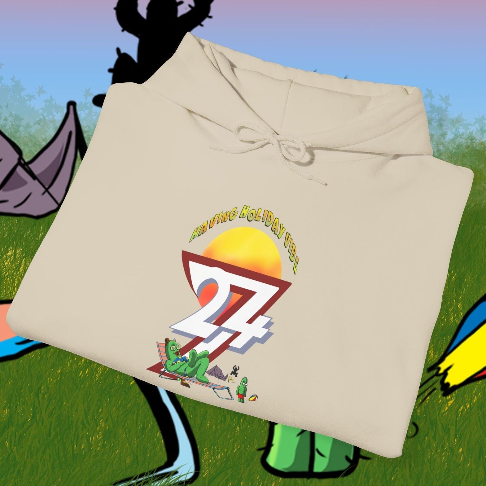 folded beige cactus hoodie with cartoon camping design and adjustable drawstring hood