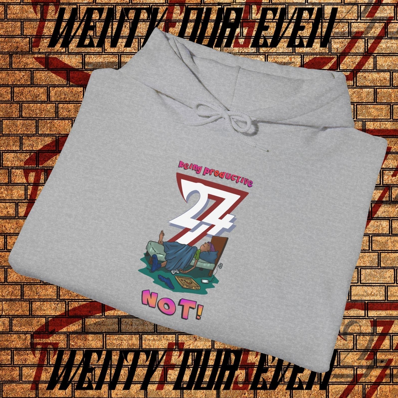 grey funny custom hoodie with cartoon lazy teen design and text "being productive? 24 NO T!" folded on brick wall background