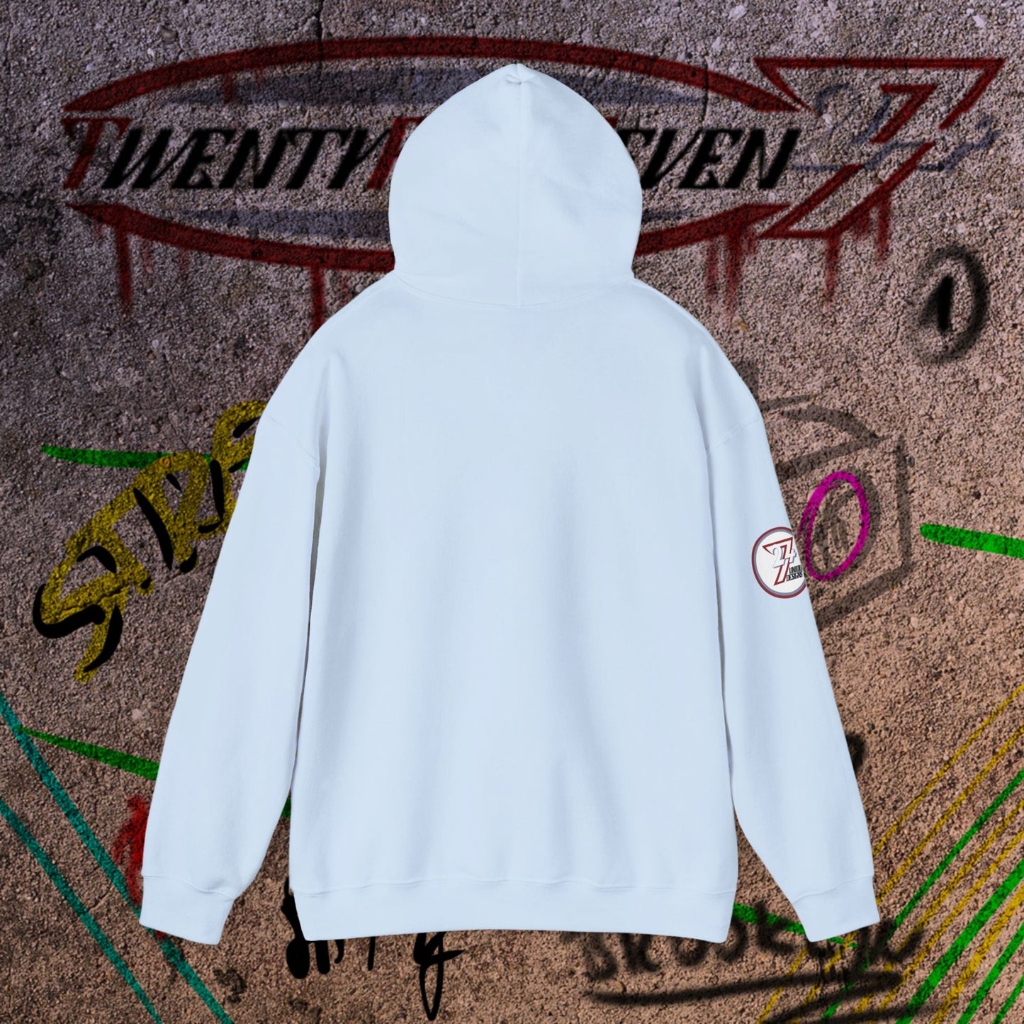 light blue streetwear hoodie with hood and logo patch on sleeve against urban graffiti background