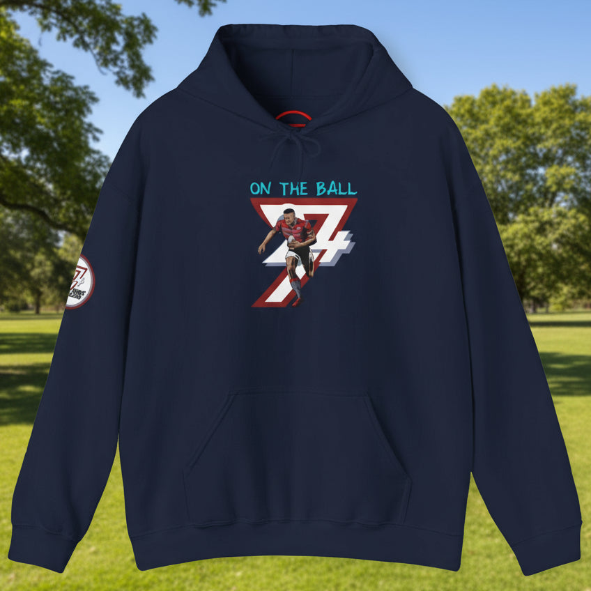 navy rugby hoodie with vibrant hand-drawn rugby player design and "ON THE BALL" text