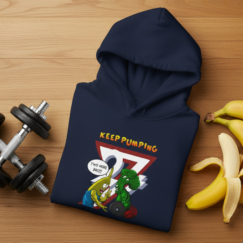 navy workout hoodie with cartoon broccoli and banana characters and "Keep Pumping" text design