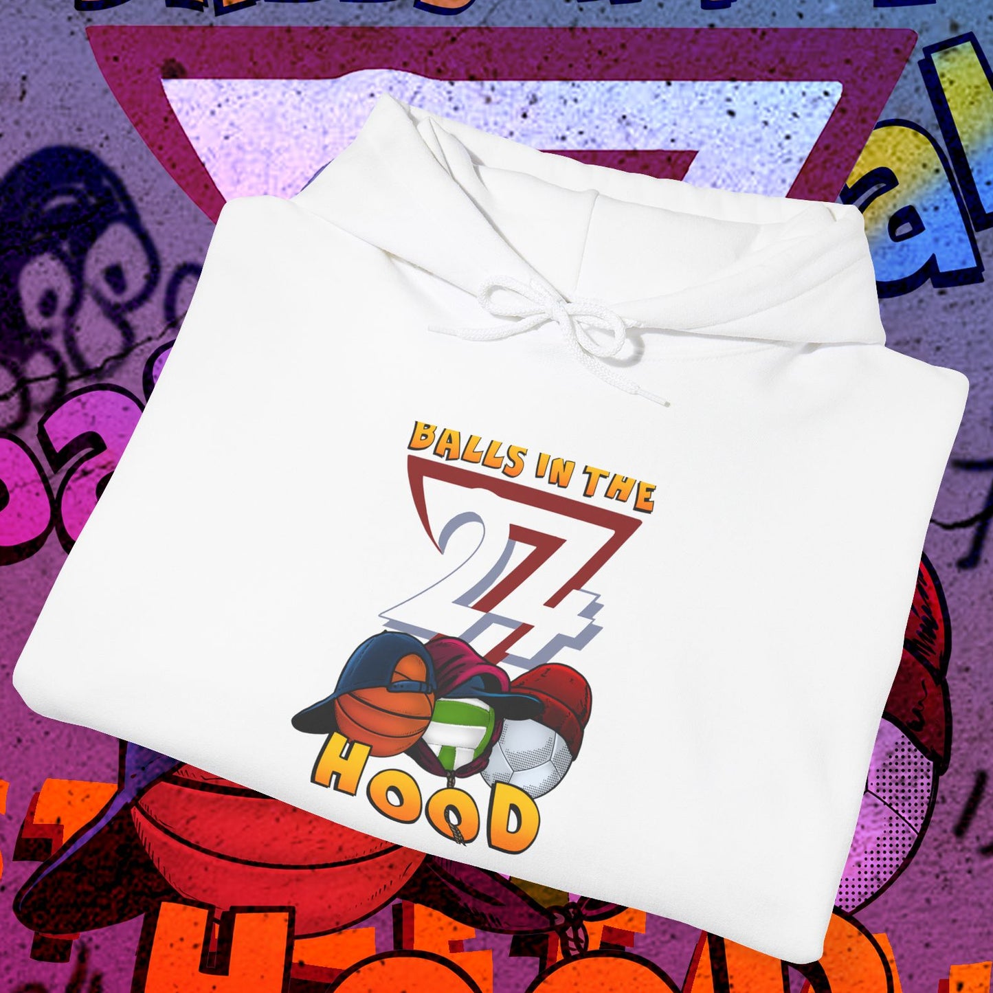 white printed hoodie with colorful balls graphic and "Balls in the Hood" text, urban streetwear style for ballgames and city nights