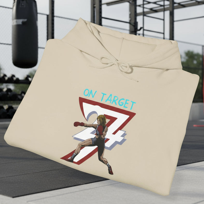 Beige women's boxing hoodie with feminine boxer illustration and "On Target" text, adjustable hood, and kangaroo pocket.