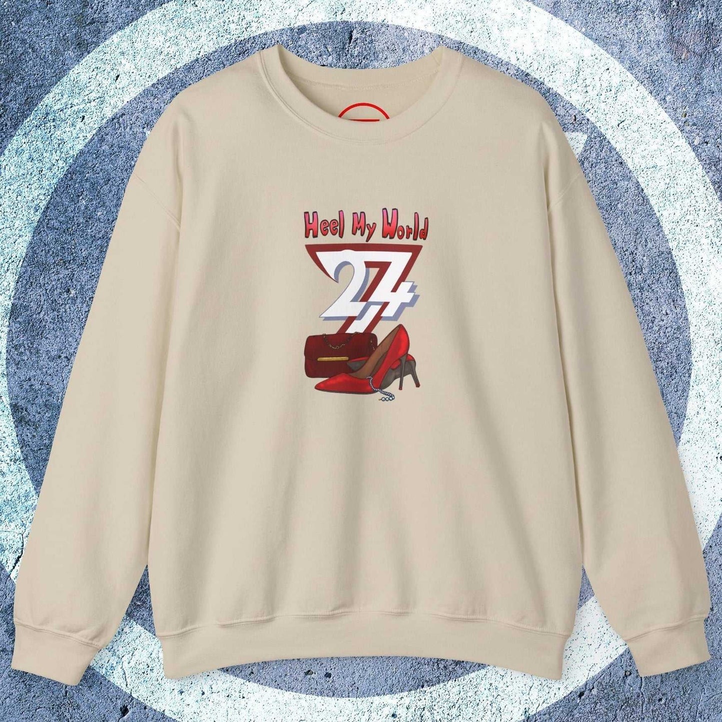 Beige women's graphic sweatshirt with handbag and high-heel design and "Heel My World" text on front