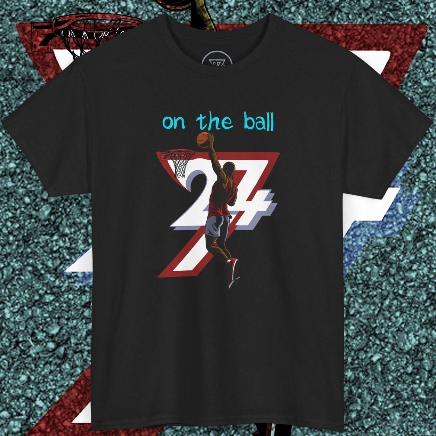 Black 90s comic-style basketball tee with hand-drawn dunk graphic and "on the ball" text