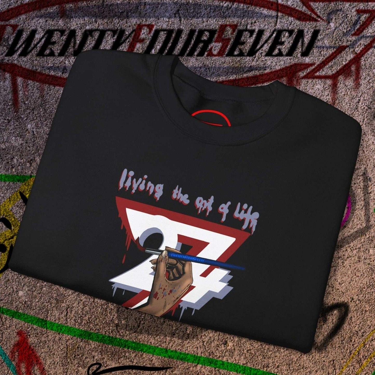 Black artist brush sweatshirt with hand-drawn "living the art of life" design featuring number 24 and a paintbrush.