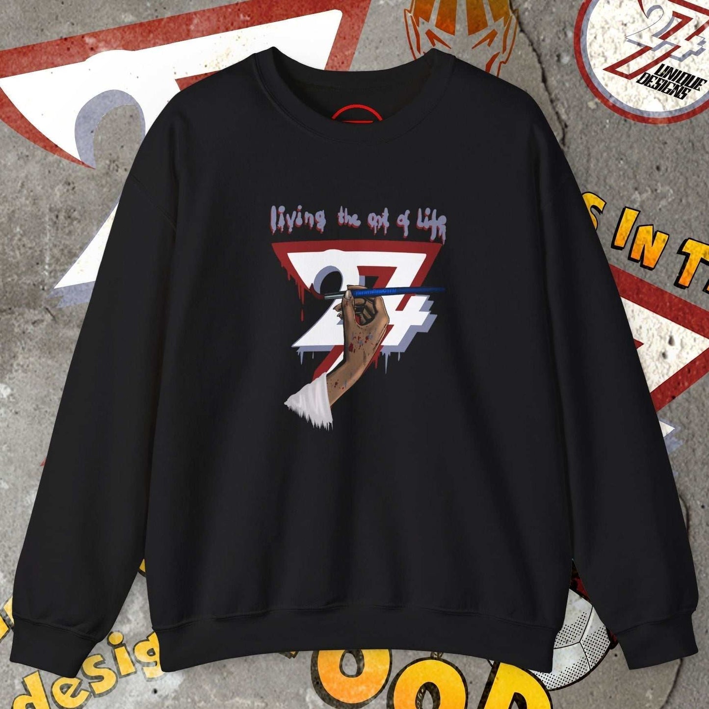 Black artist brush sweatshirt with hand-drawn bohemian design and "living the art of life" text on front