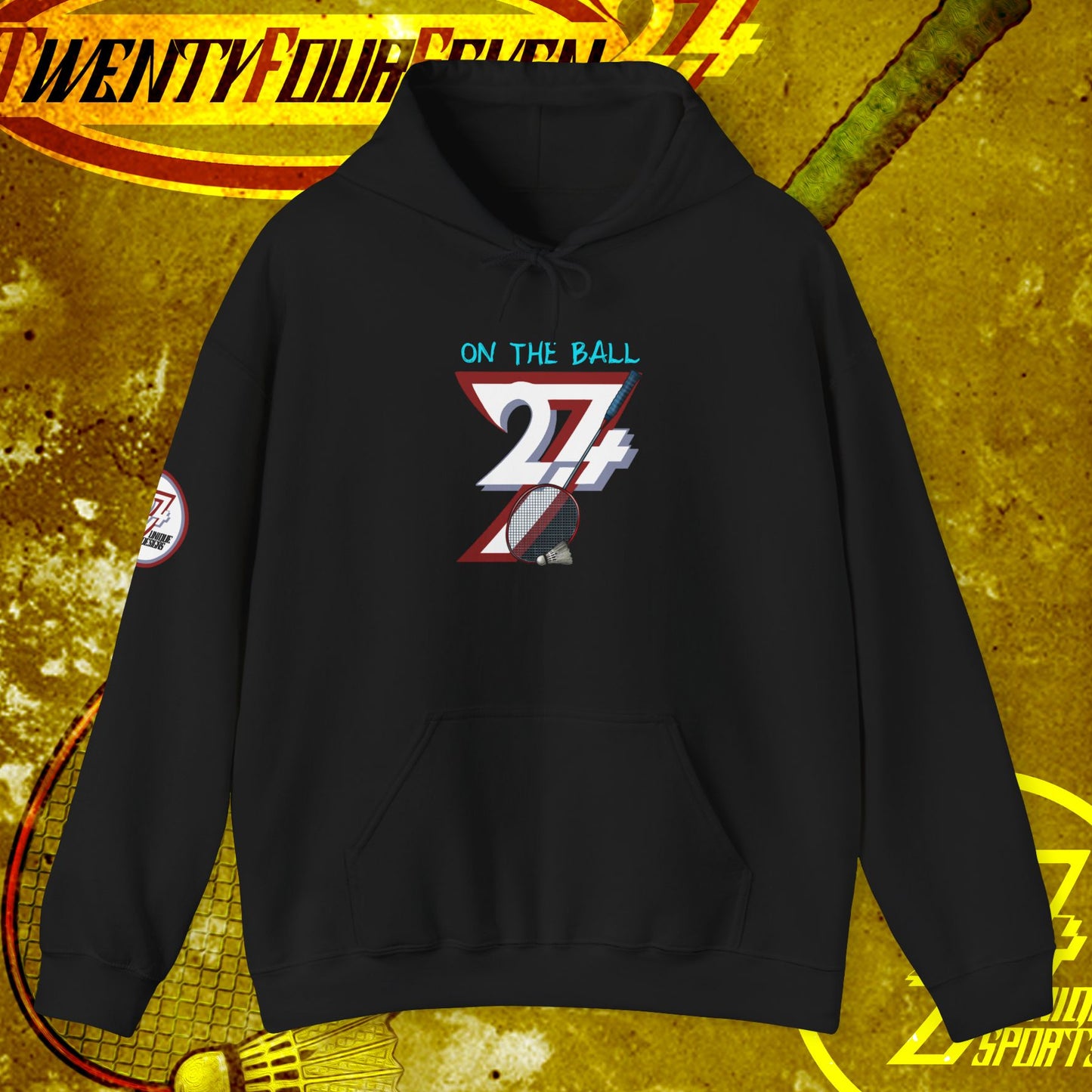 Black badminton hoodie sweatshirt with colorful "On The Ball 24/7" design and kangaroo pocket, ideal for outdoor sports and casual wear