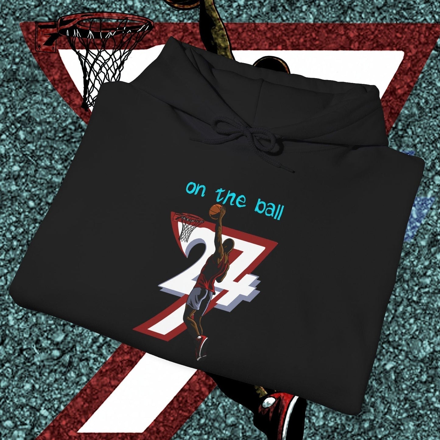 Black basketball hoodie with hand-drawn basketball player design and "on the ball" text, stylish streetwear for training and casual wear