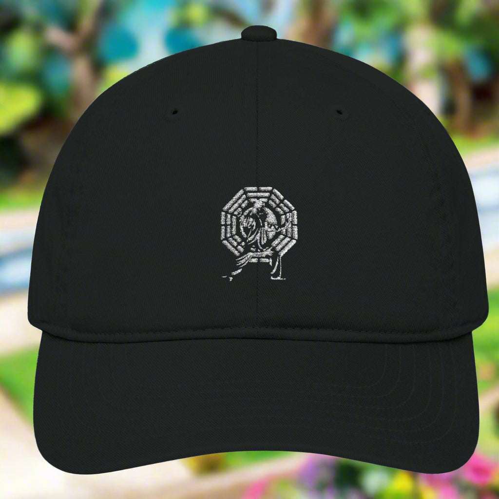 Black embroidered baseball cap with Thai Chi logo, made of 100% organic cotton.