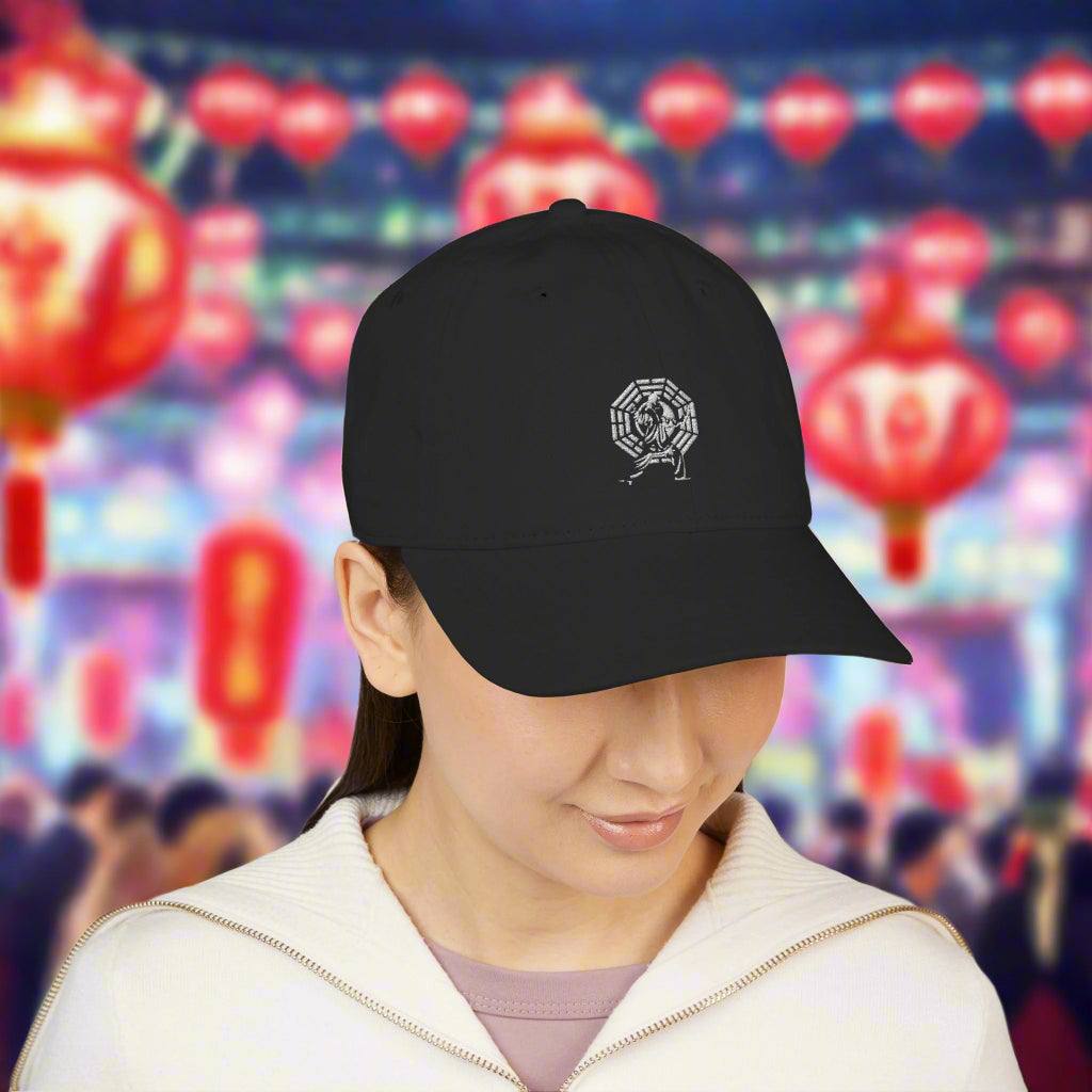 Black embroidered baseball cap with Thai Chi logo, made from 100% organic cotton, unstructured 6-panel design, breathable eyelets, perfect for casual outdoor wear.