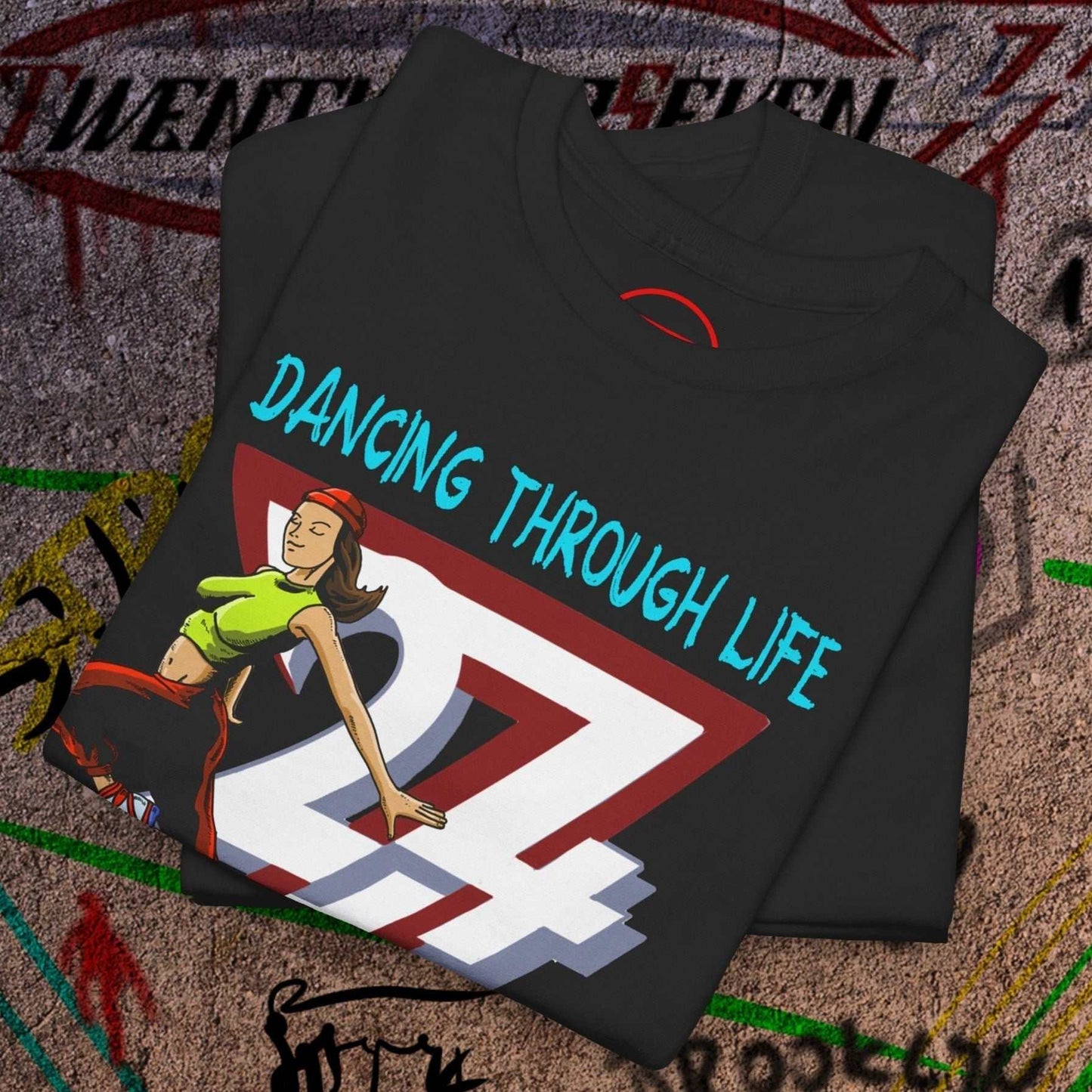 Black streetwear tee featuring a hand-drawn dancing girl and "Dancing Through Life" text, cotton fabric, relaxed fit, crew neckline.
