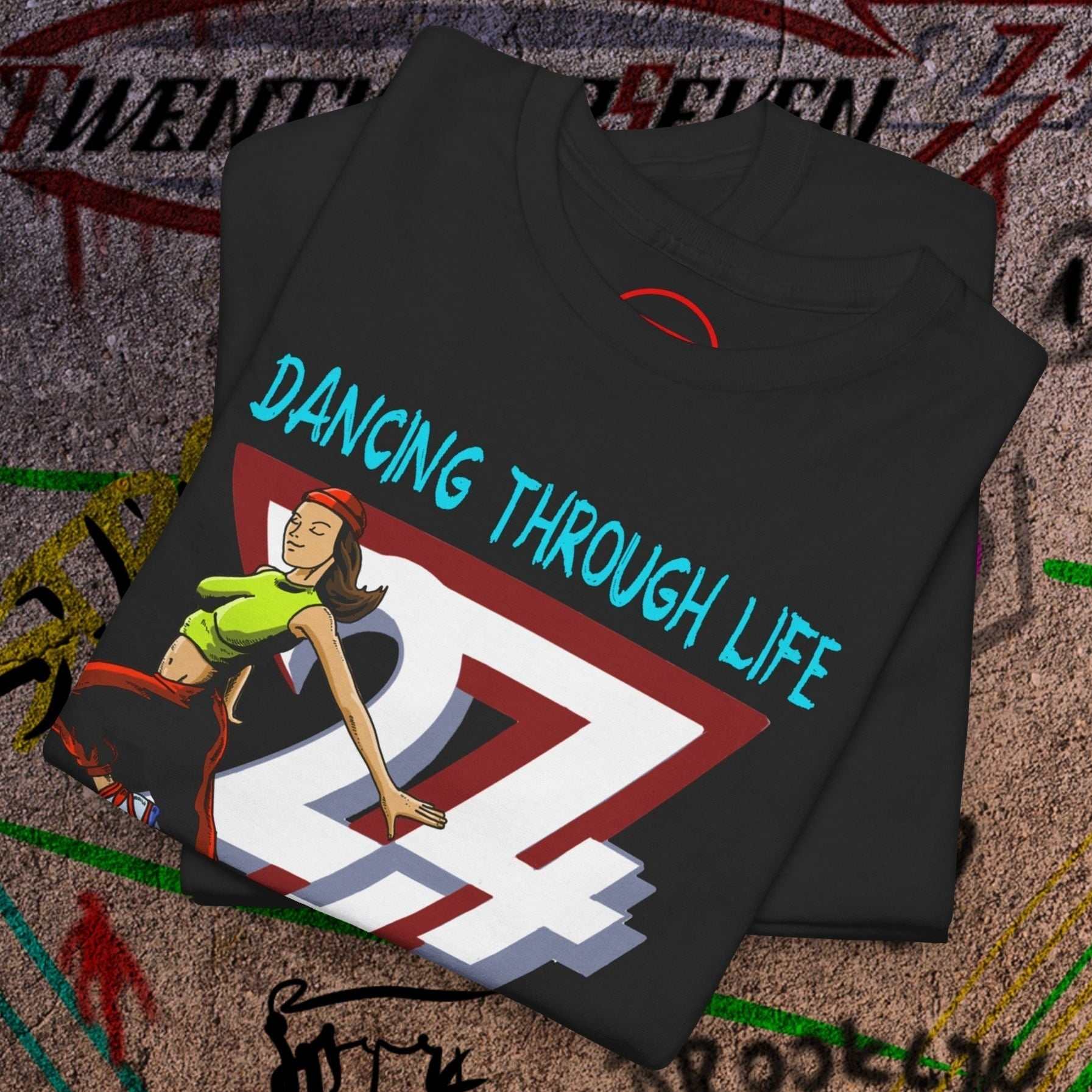 Black streetwear tee featuring a hand-drawn dancing girl and "Dancing Through Life" text, cotton fabric, relaxed fit, crew neckline.