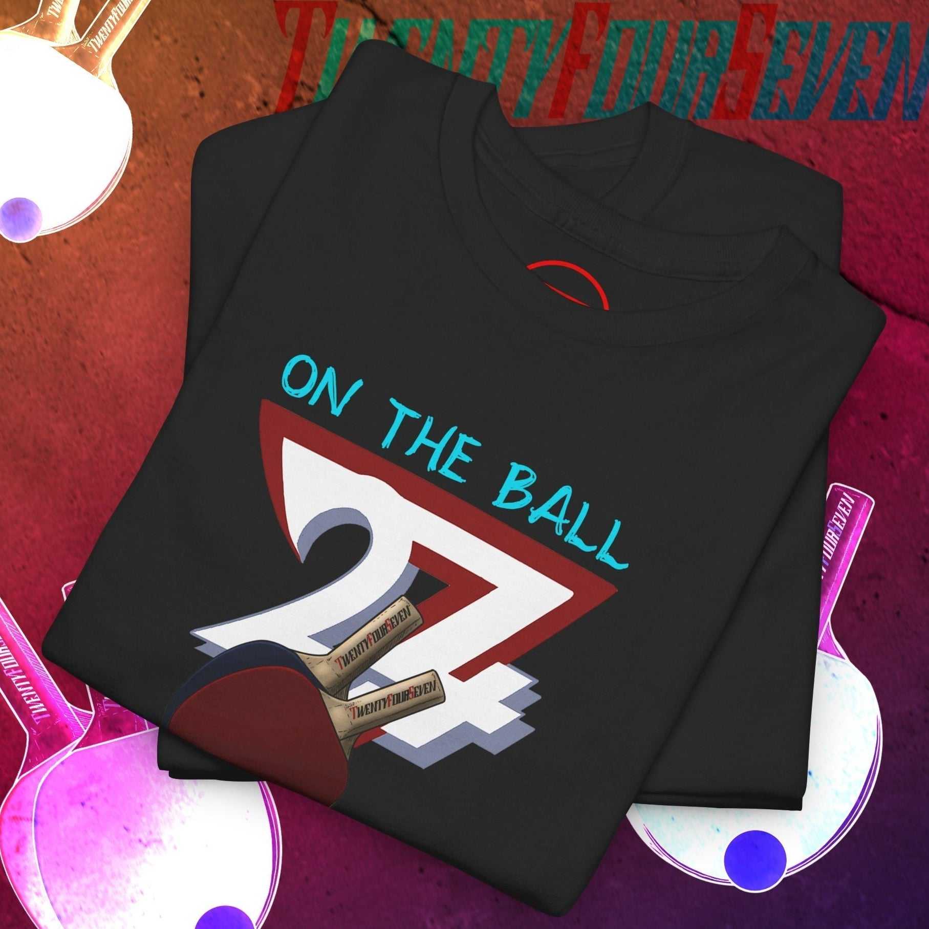 Black table tennis t-shirt with hand-drawn 90s style ping pong graphic and "On The Ball" text.