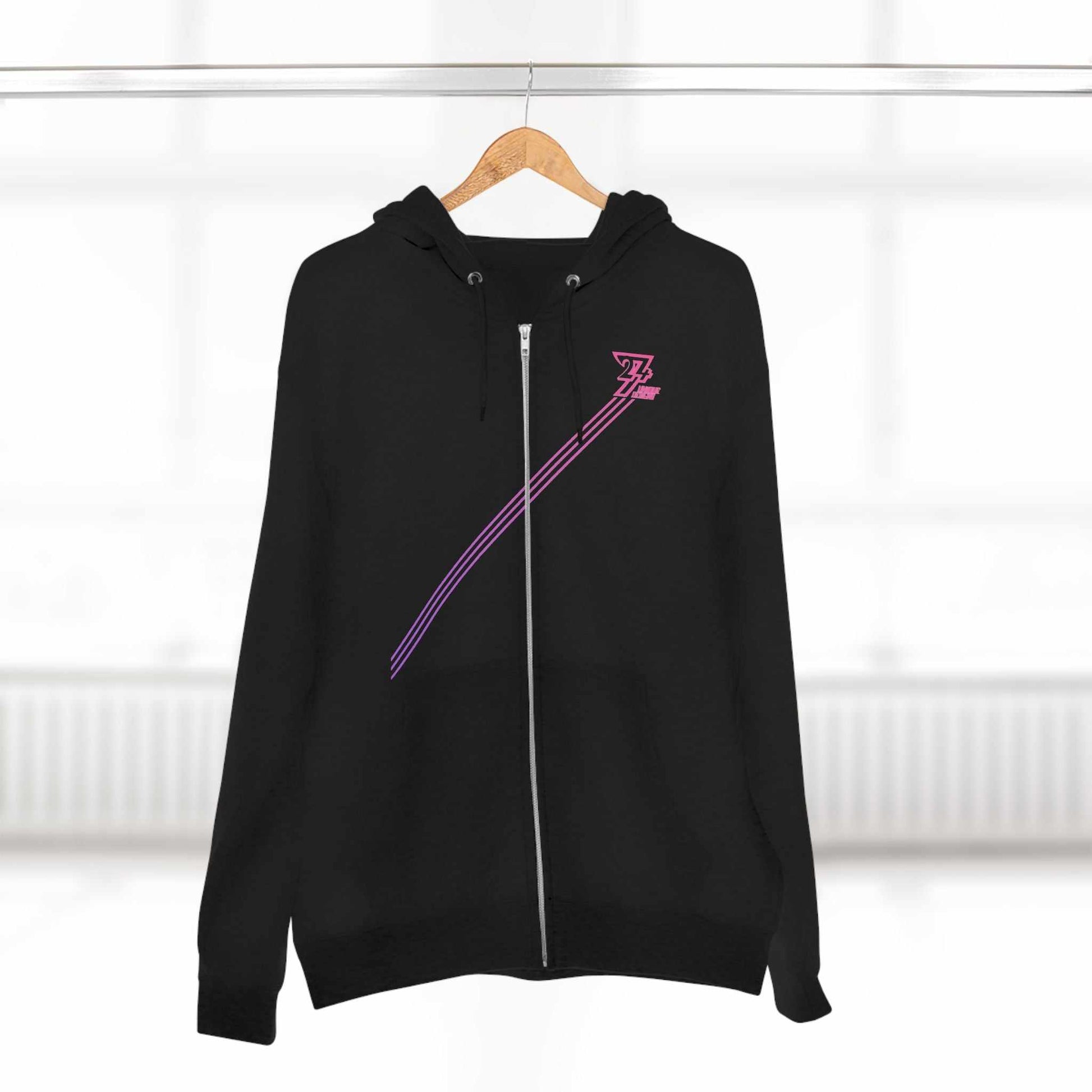 Black women hoodie with pink-striped diagonal design and zipper closure hanging on wooden hanger