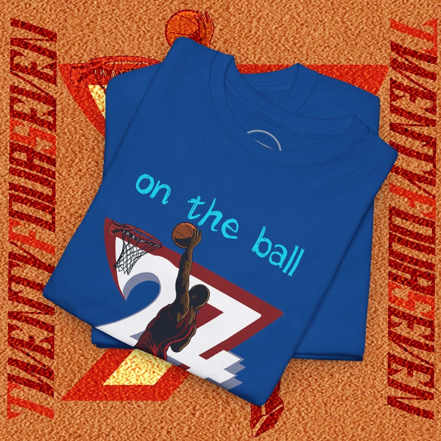 Blue 90s comic-style basketball tee with hand-drawn silhouette dunking a ball and "on the ball" text on chest