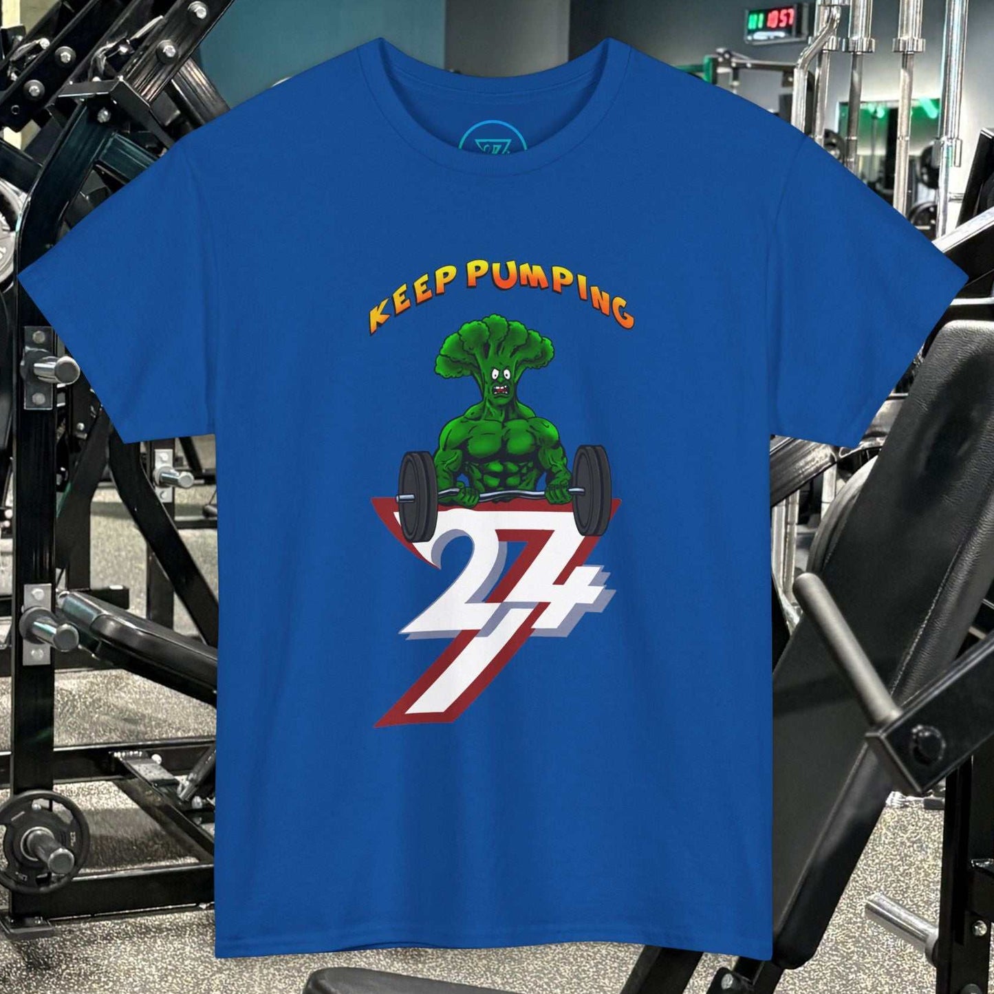 Blue Broccoli Weightlifting Cartoon T-Shirt with "Keep Pumping" design in gym setting