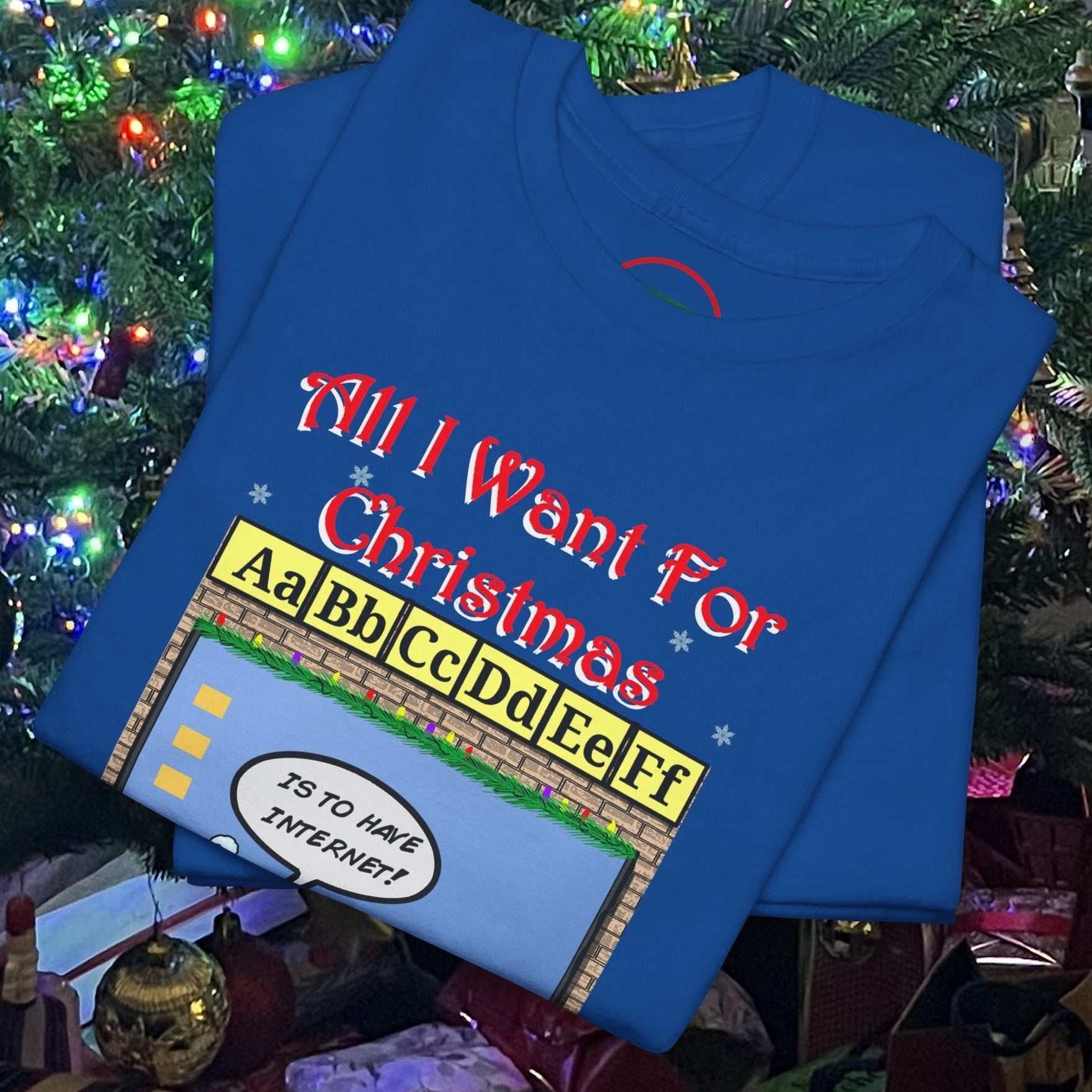 Blue Teacher Elf T-Shirt with Christmas-themed classroom alphabet and "All I Want For Christmas is to Have Internet" text under decorated Christmas tree lights