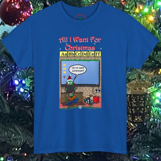 Blue Teacher Elf T-Shirt with cartoon elf and Christmas classroom theme placed in front of a decorated Christmas tree
