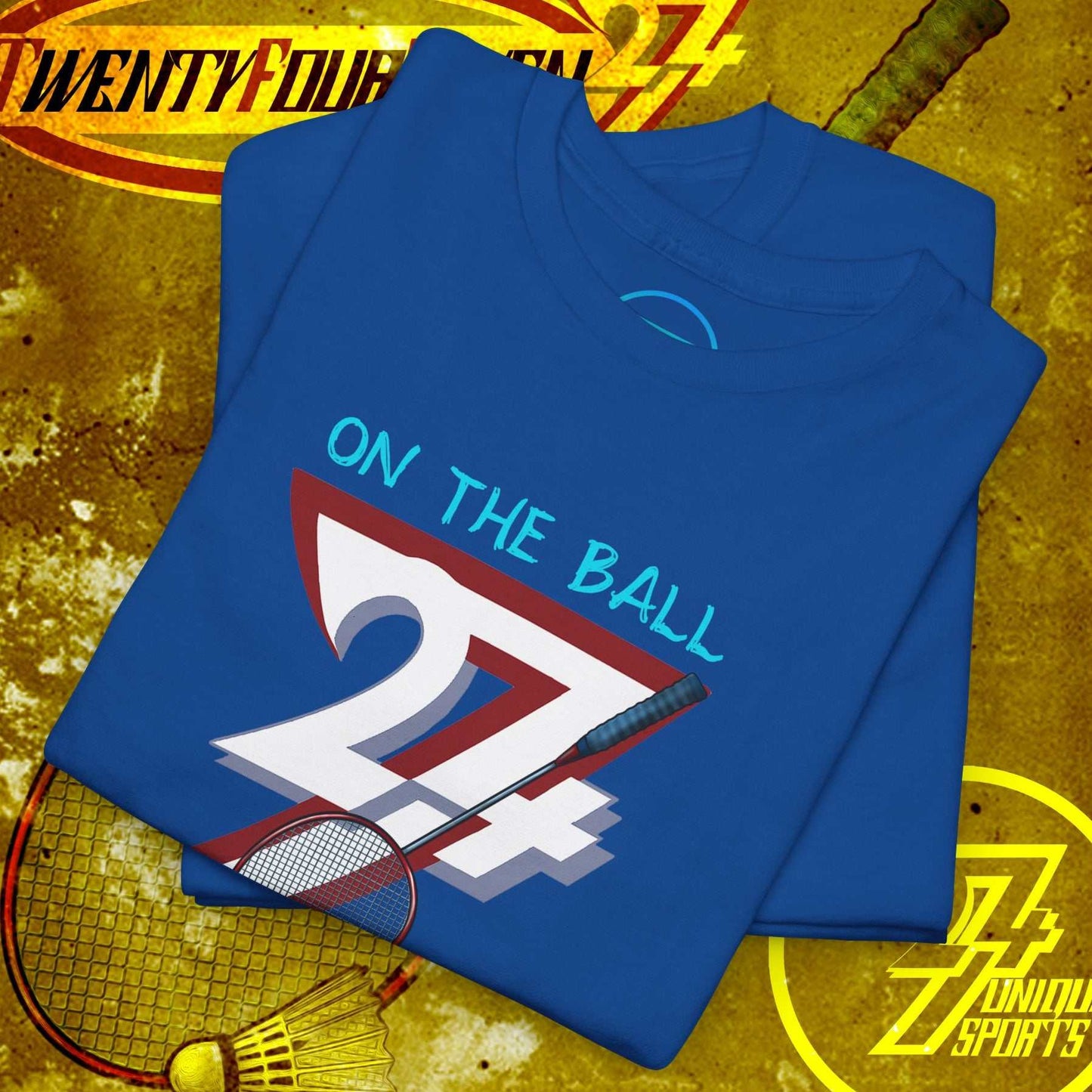 Blue badminton hand-drawn graphic tee with "On The Ball 24/7" design and shuttlecock illustration