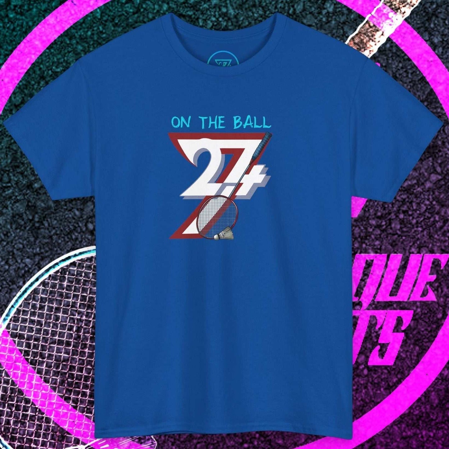 Blue badminton hand-drawn graphic tee with "On The Ball 24/7" design, classic crew neck, and relaxed fit.