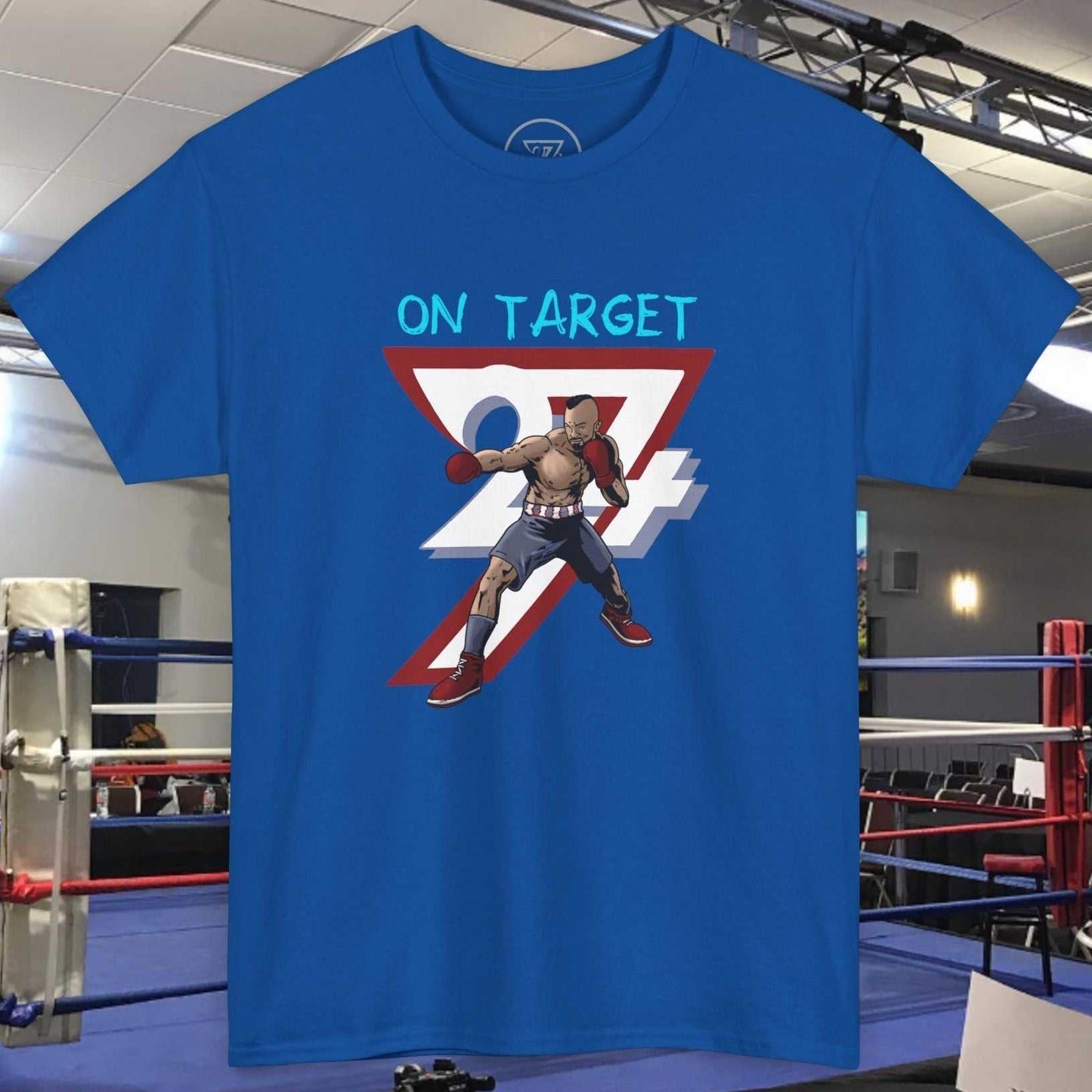 Blue boxing tee with comic-style illustration of a boxer and "ON TARGET" text in a boxing ring setting