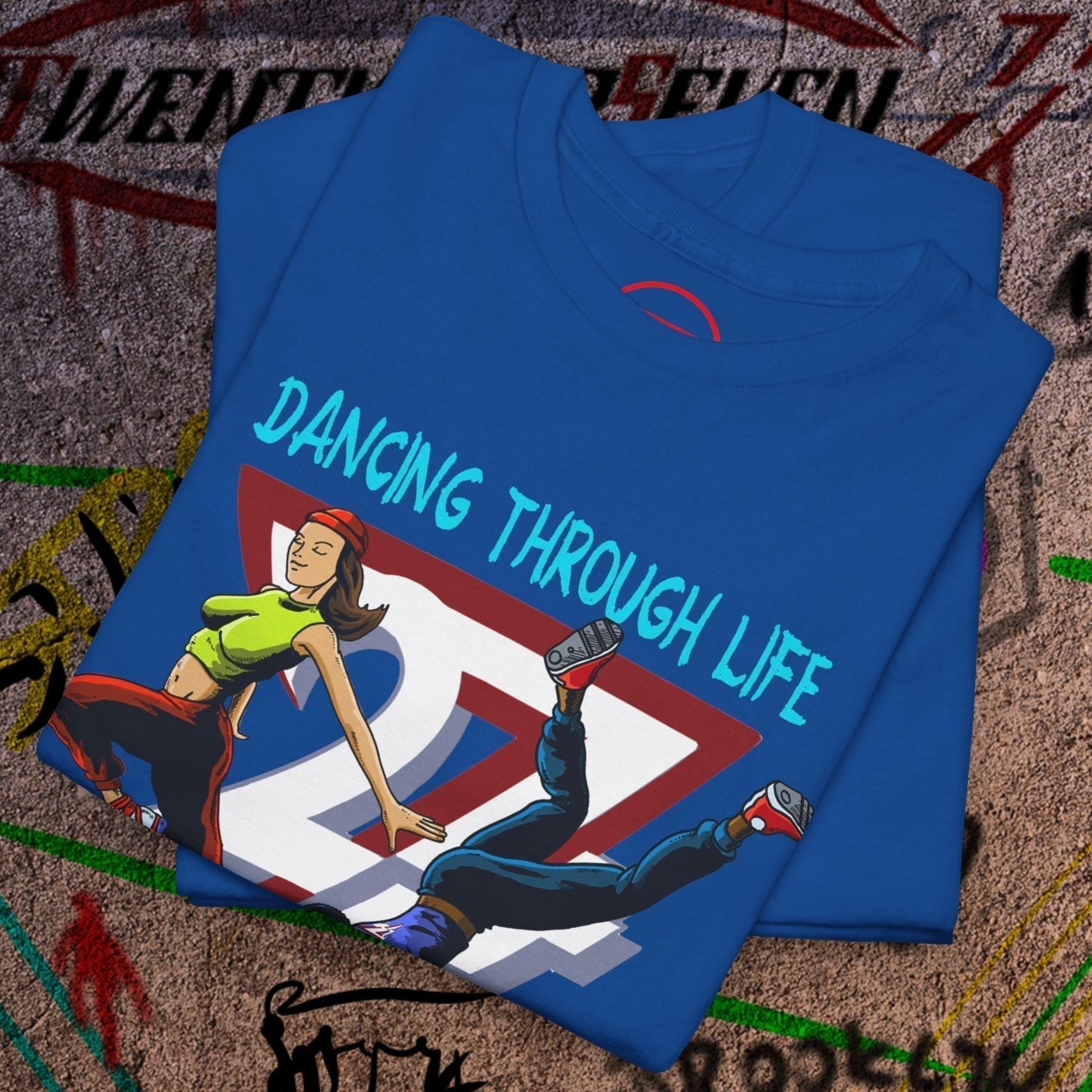 Blue dance t-shirt with 90s funky groovy comic-style dancers and "Dancing Through Life" text on front.