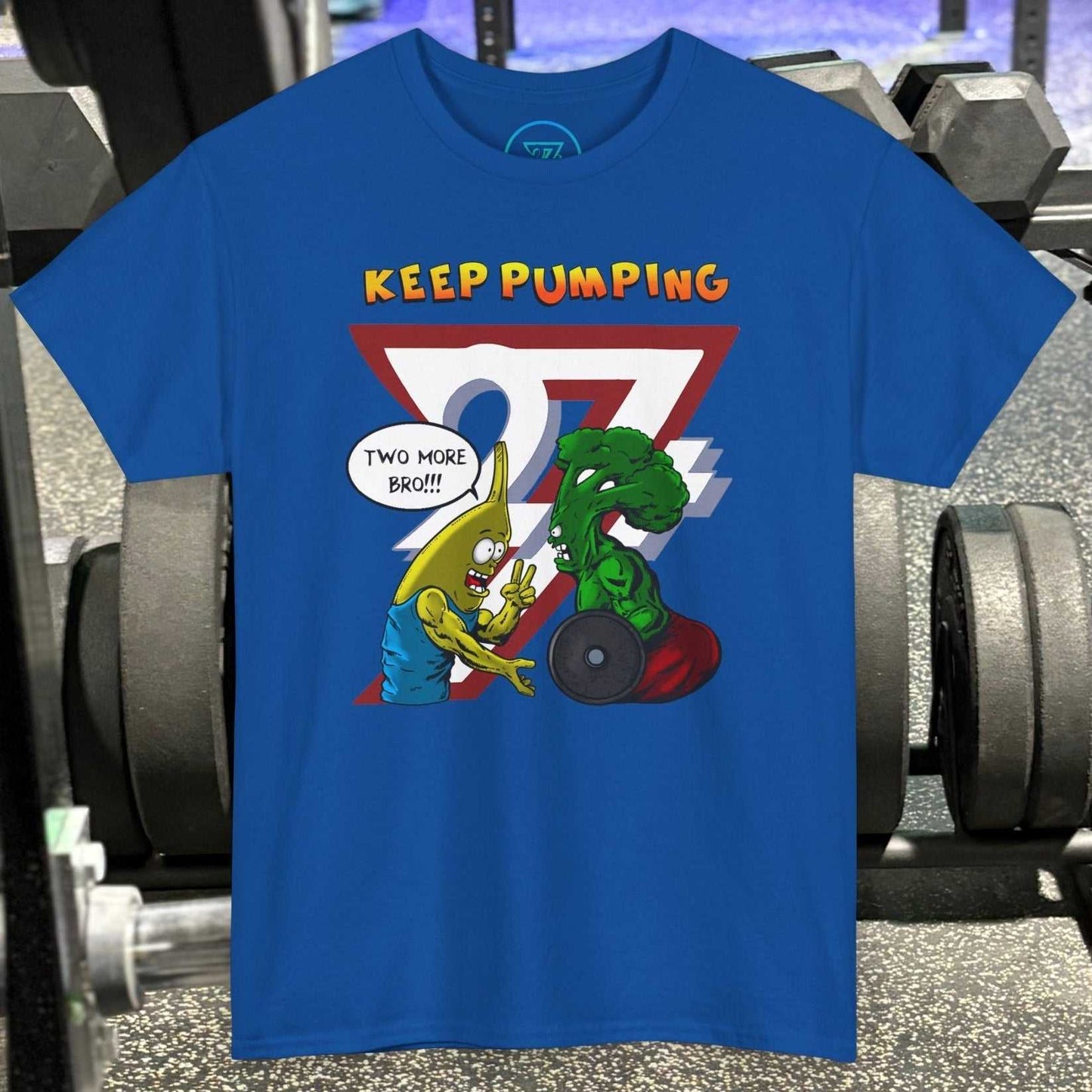 Blue funny broccoli gym tee with cartoon broccoli and banana lifting weights and "Keep Pumping" text