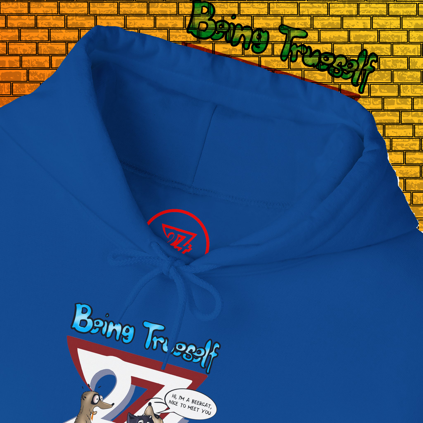 Blue hoodie with cartoon meerkat and cat illustration and "Being True-Self" text on front