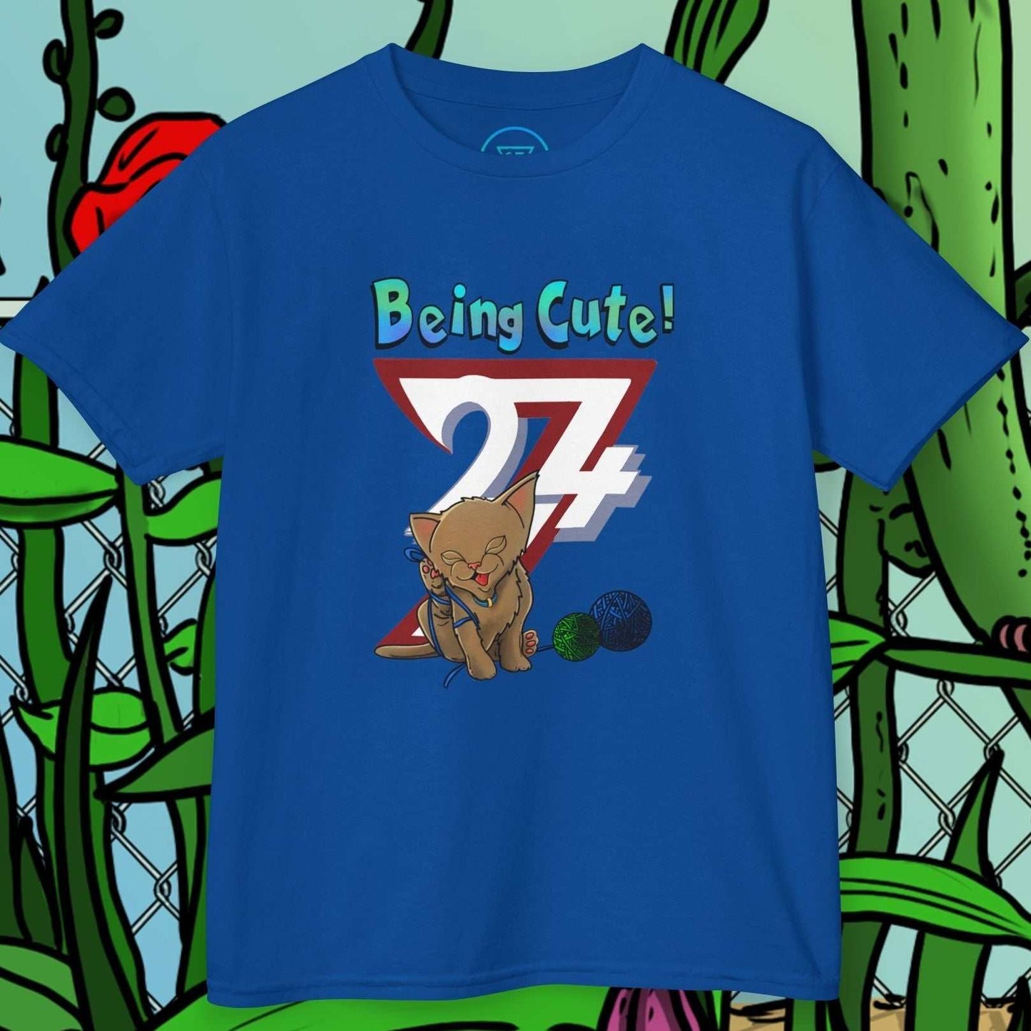 Blue kids cat t-shirt with hand-drawn playful kitten and "Being Cute! 24/7" text design