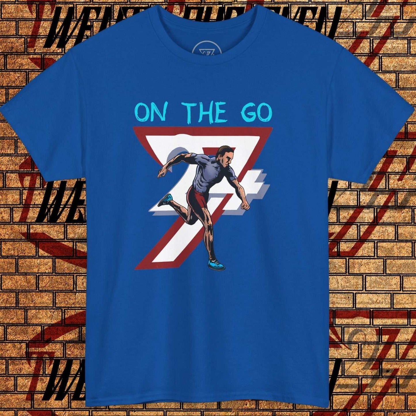 Blue running T-shirt with hand-drawn illustration of a runner and "On The Go" text, lightweight cotton activewear for training and lifestyle.